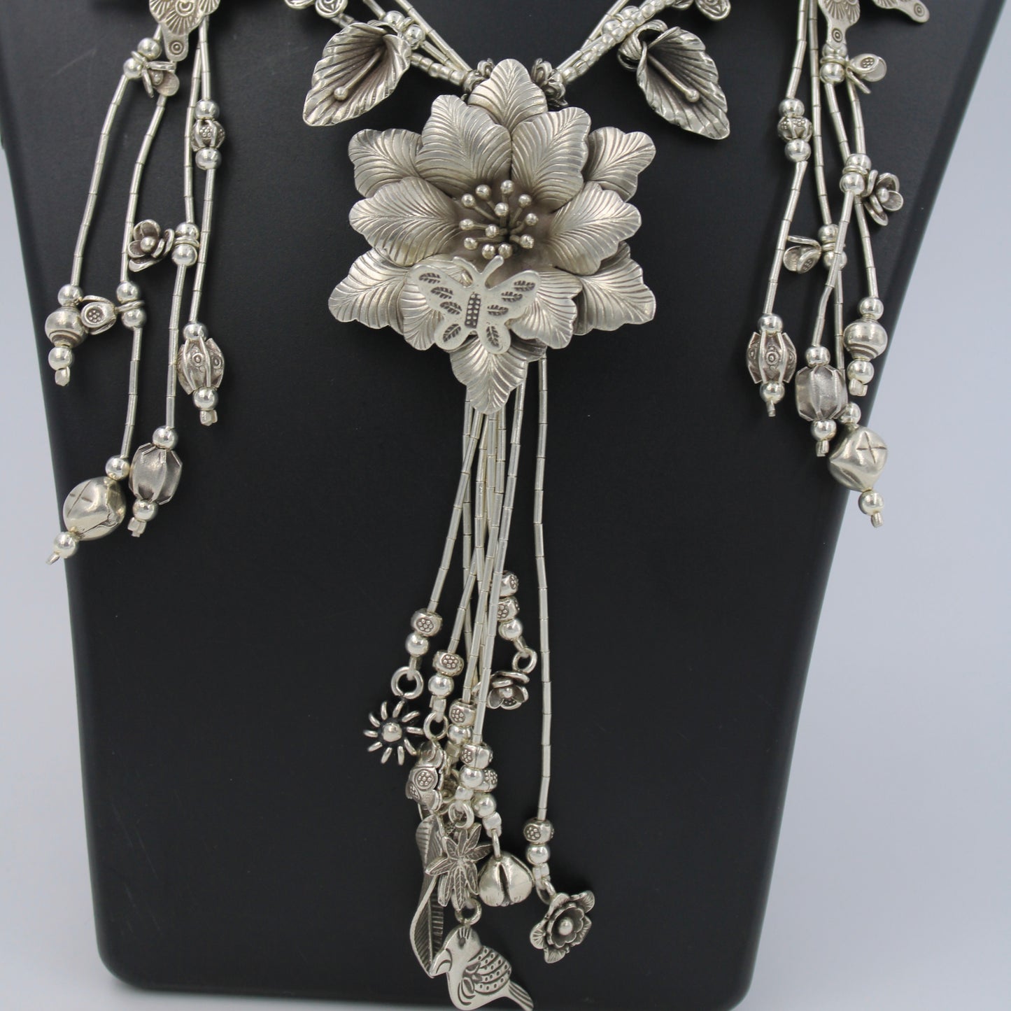 Handmade Indonesian Flower and Butterfly Charm Necklace in Sterling Silver