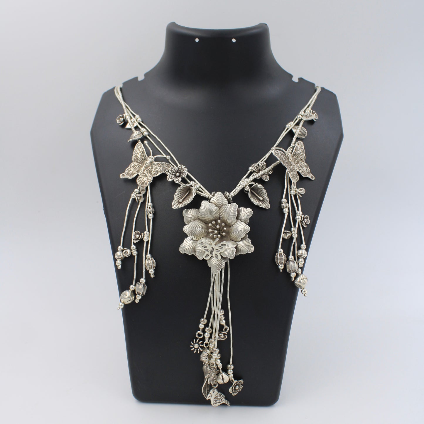 Handmade Indonesian Flower and Butterfly Charm Necklace in Sterling Silver