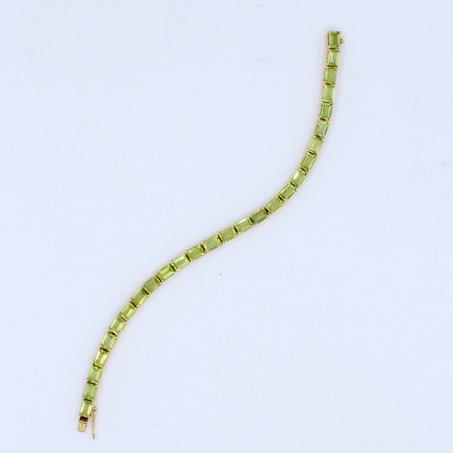 Natural 14.0 Ct Peridot Tennis Bracelet in 18K Yellow Gold