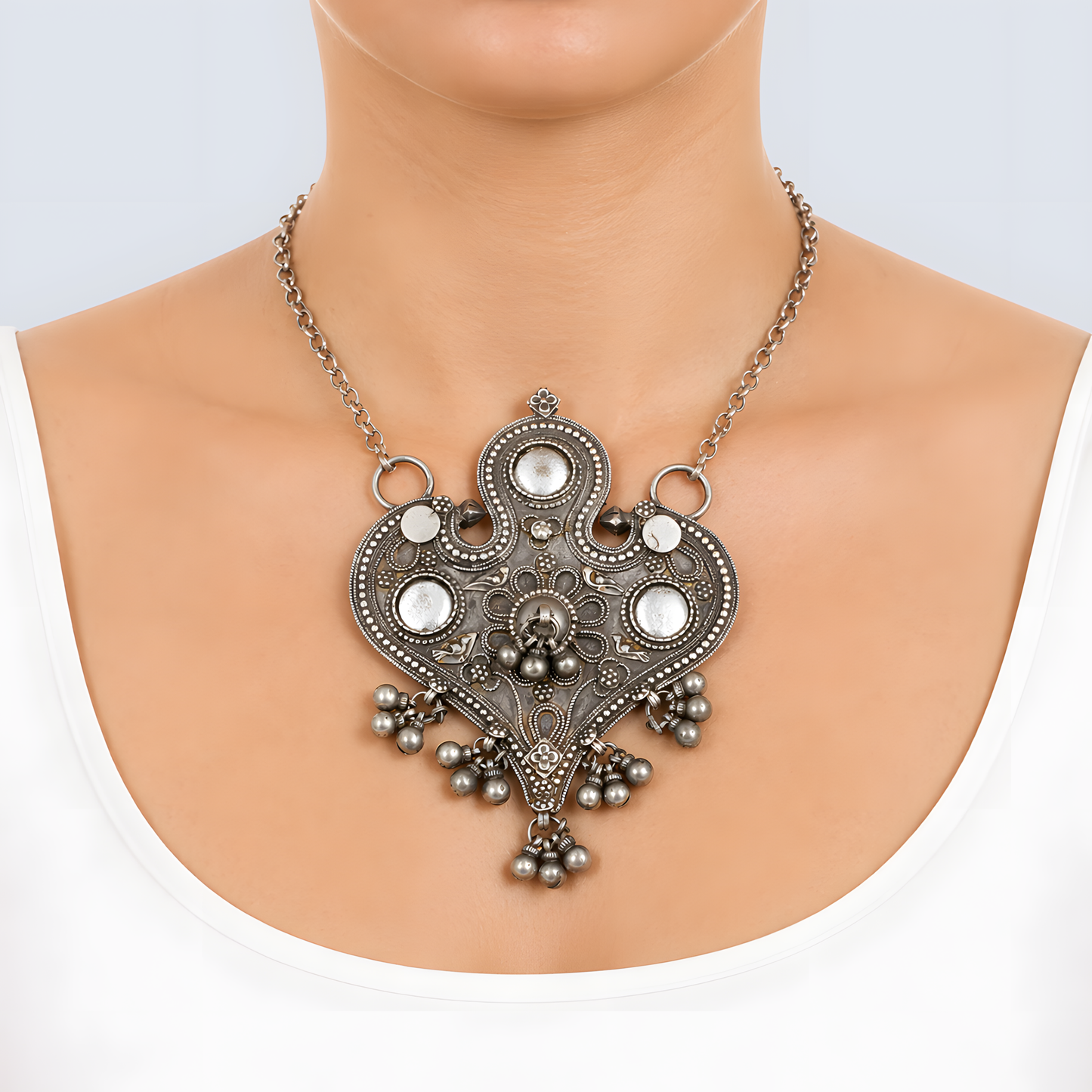 Antique Silver Heart-Shaped Tribal Pendant with Inlaid Glass & Ghungroo In Sterling silver