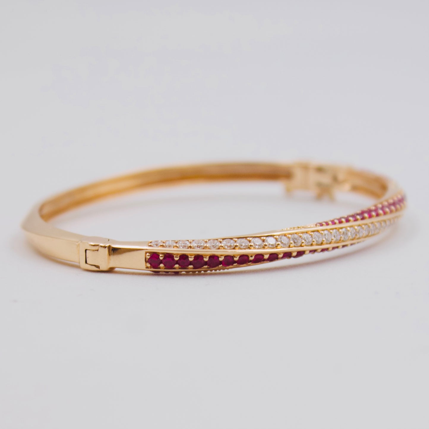 2.31 Ct Burma Ruby & Diamond Twisted Crossover Hinged Bangle in 18k Rose Gold