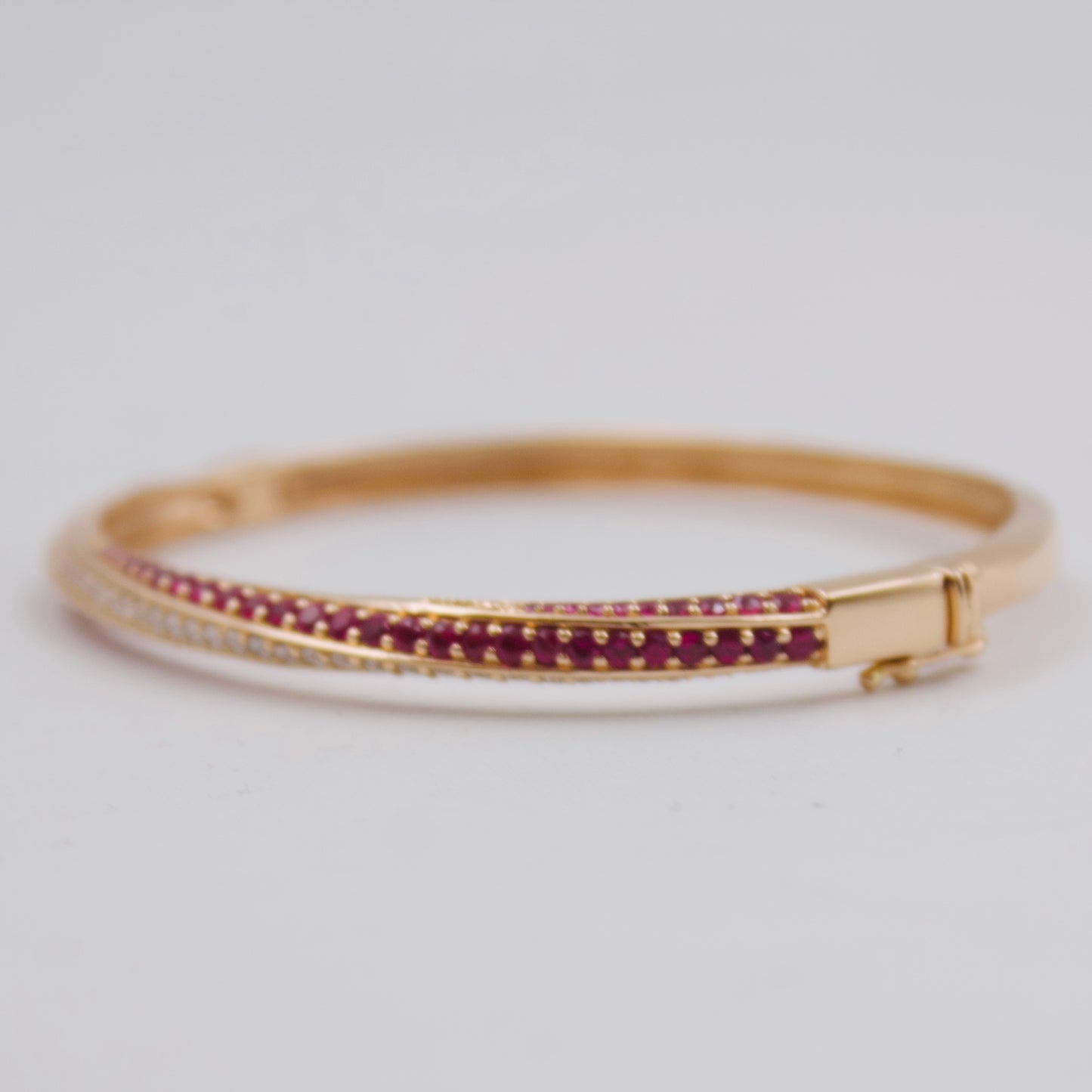 2.31 Ct Burma Ruby & Diamond Twisted Crossover Hinged Bangle in 18k Rose Gold
